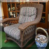 F62. Wicker rocking chair.